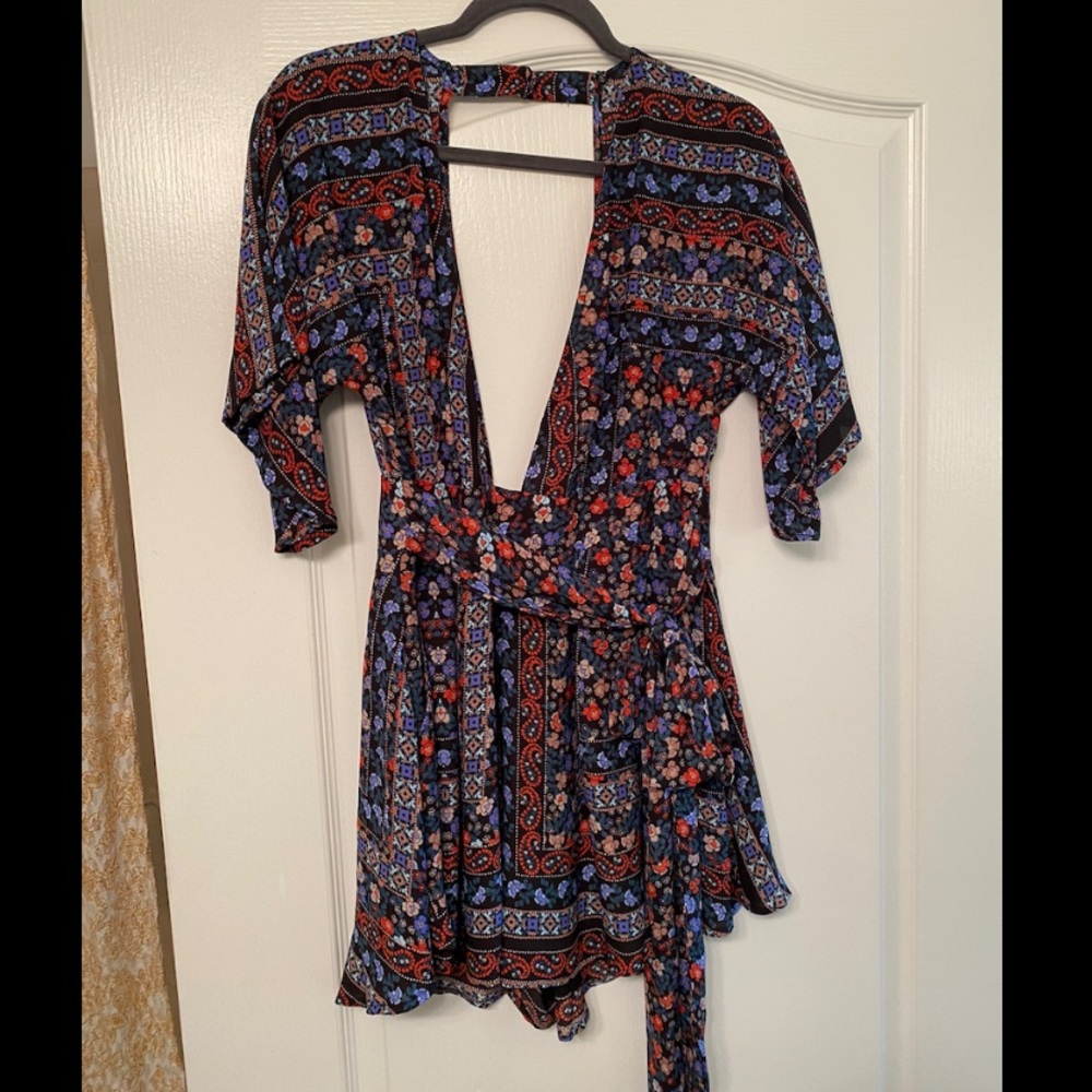 The Indigo Child deep V romper, size Large